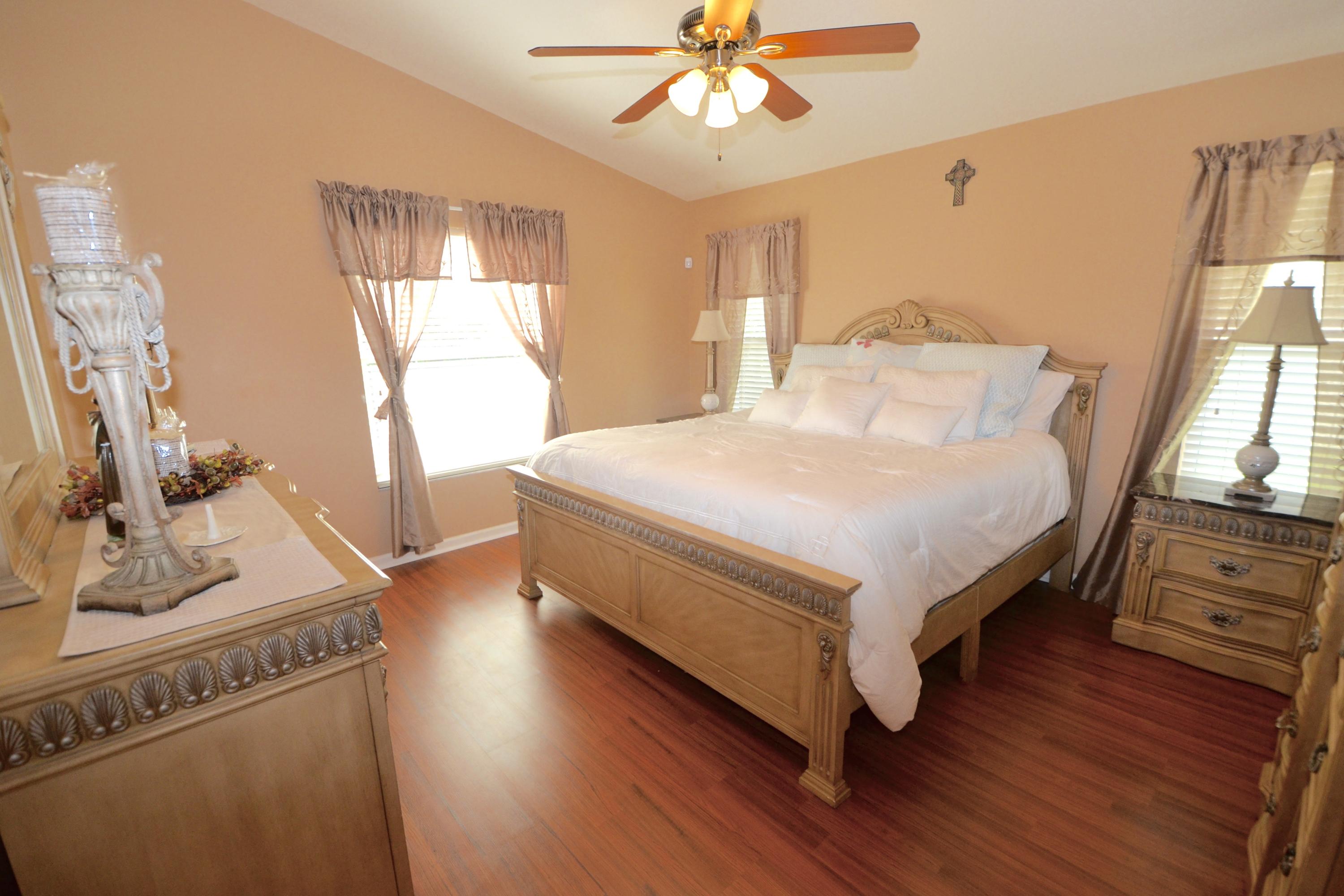 9021 Southwest Chevy Circle Stuart, FL 34997 - Photo 19 of 79 MASTER BEDROOM