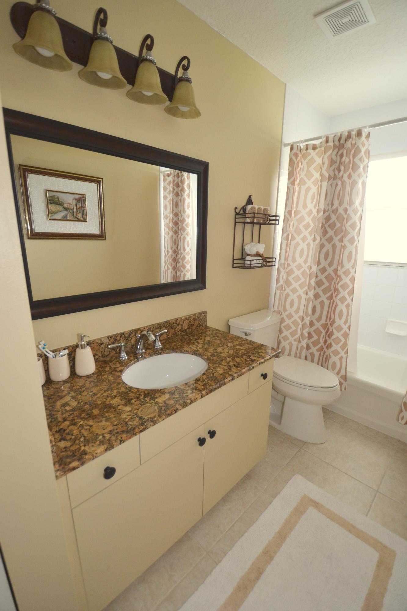 9021 Southwest Chevy Circle Stuart, FL 34997 - Photo 27 of 79 GUEST BATH
