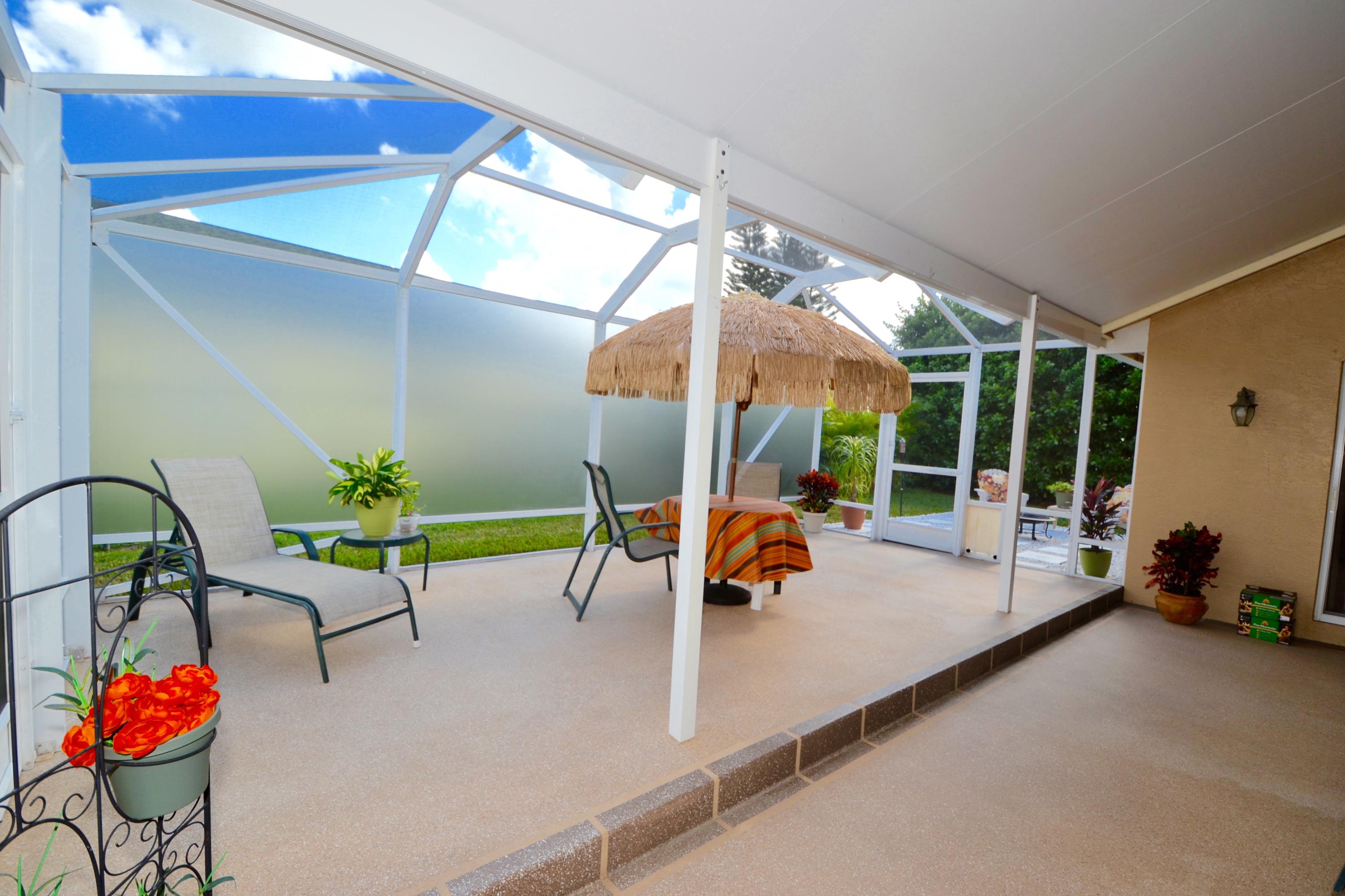 9021 Southwest Chevy Circle Stuart, FL 34997 - Photo 36 of 79 SCREENED SUN PATIO