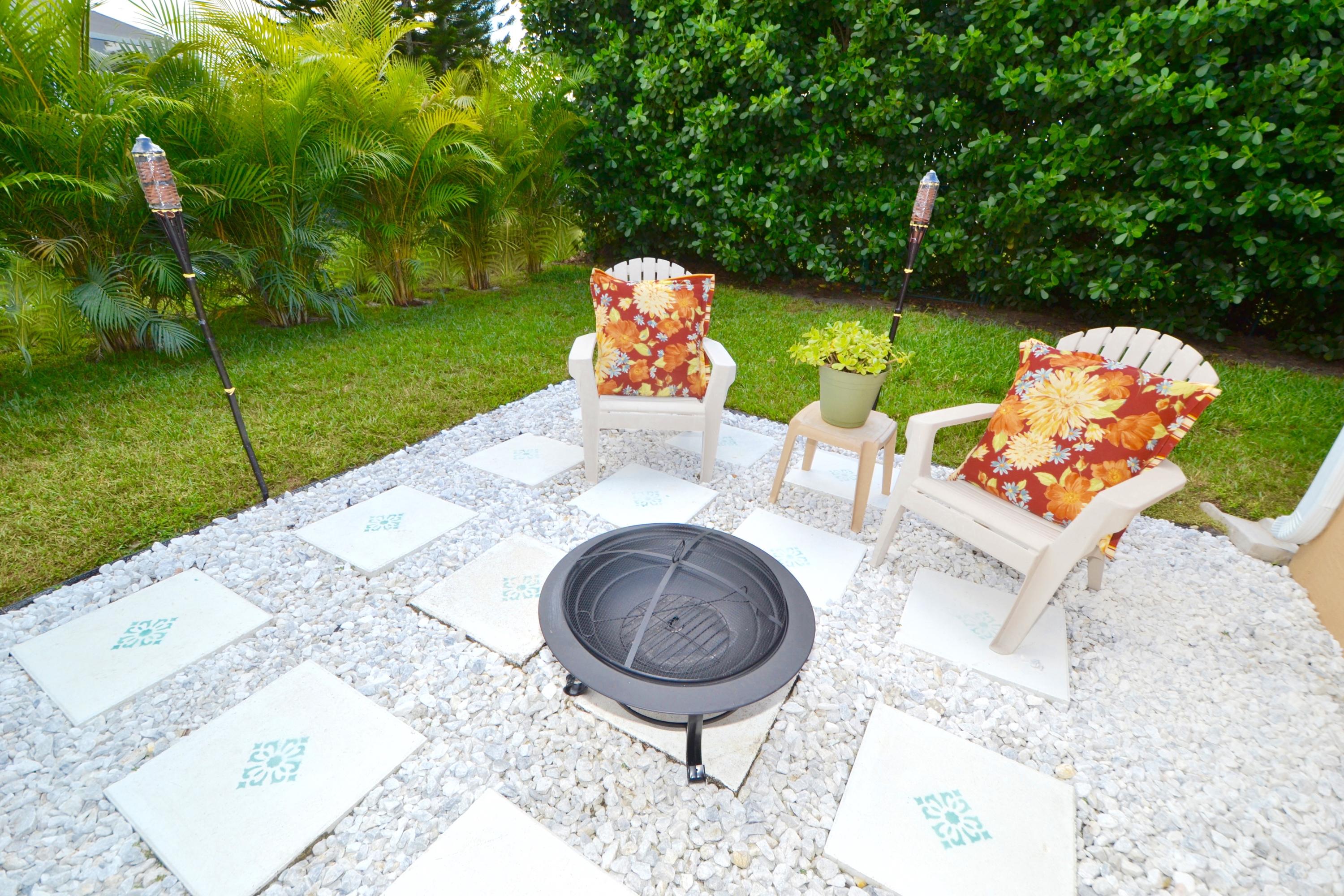9021 Southwest Chevy Circle Stuart, FL 34997 - Photo 37 of 79 BACKYARD FIRE PIT
