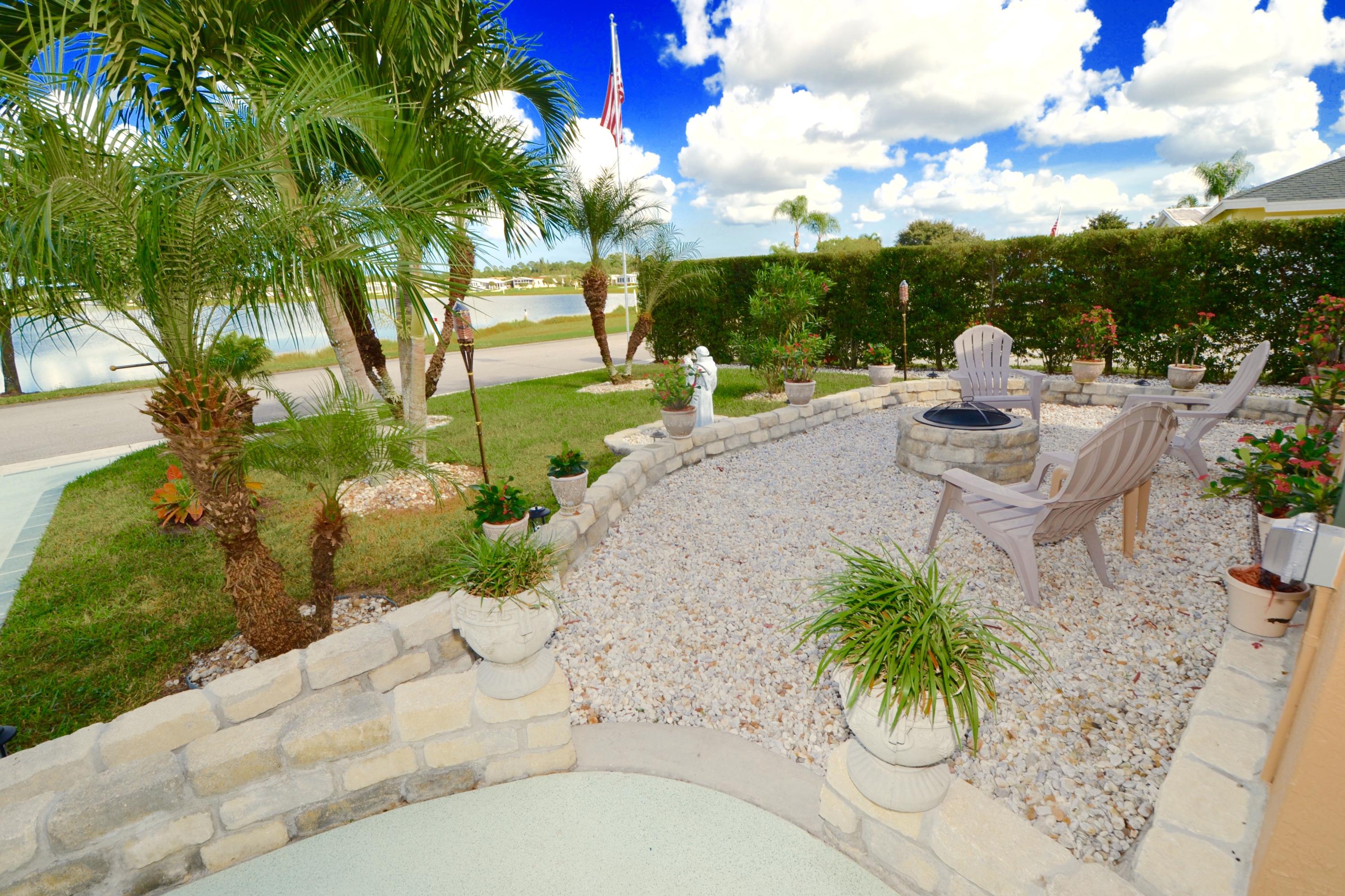 9021 Southwest Chevy Circle Stuart, FL 34997 - Photo 60 of 79 FRONTYARD CONVERSATION PIT