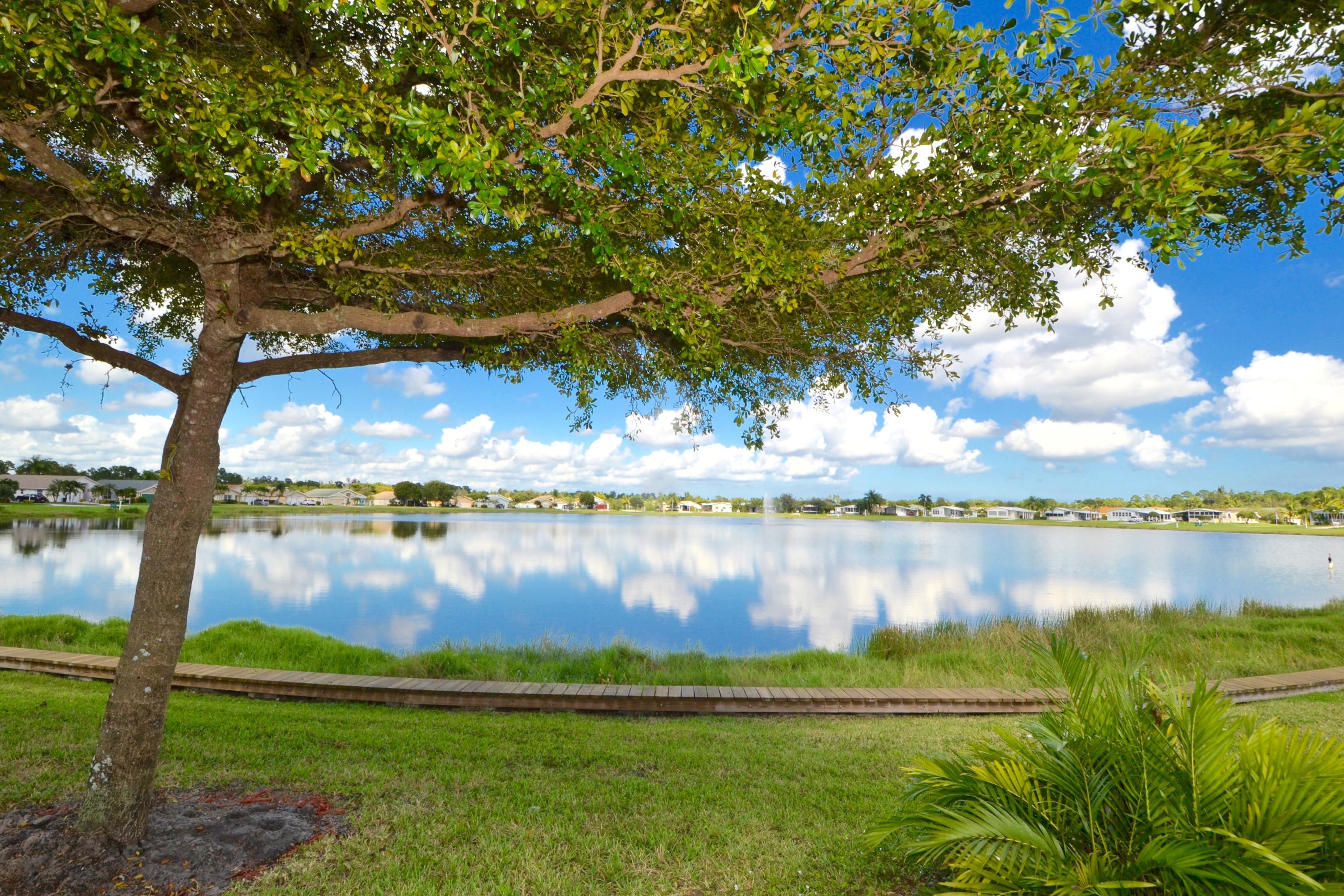 9021 Southwest Chevy Circle Stuart, FL 34997 - Photo 62 of 79 FRONT CONVERSATION PIT LOOKS OUT TO LAKE