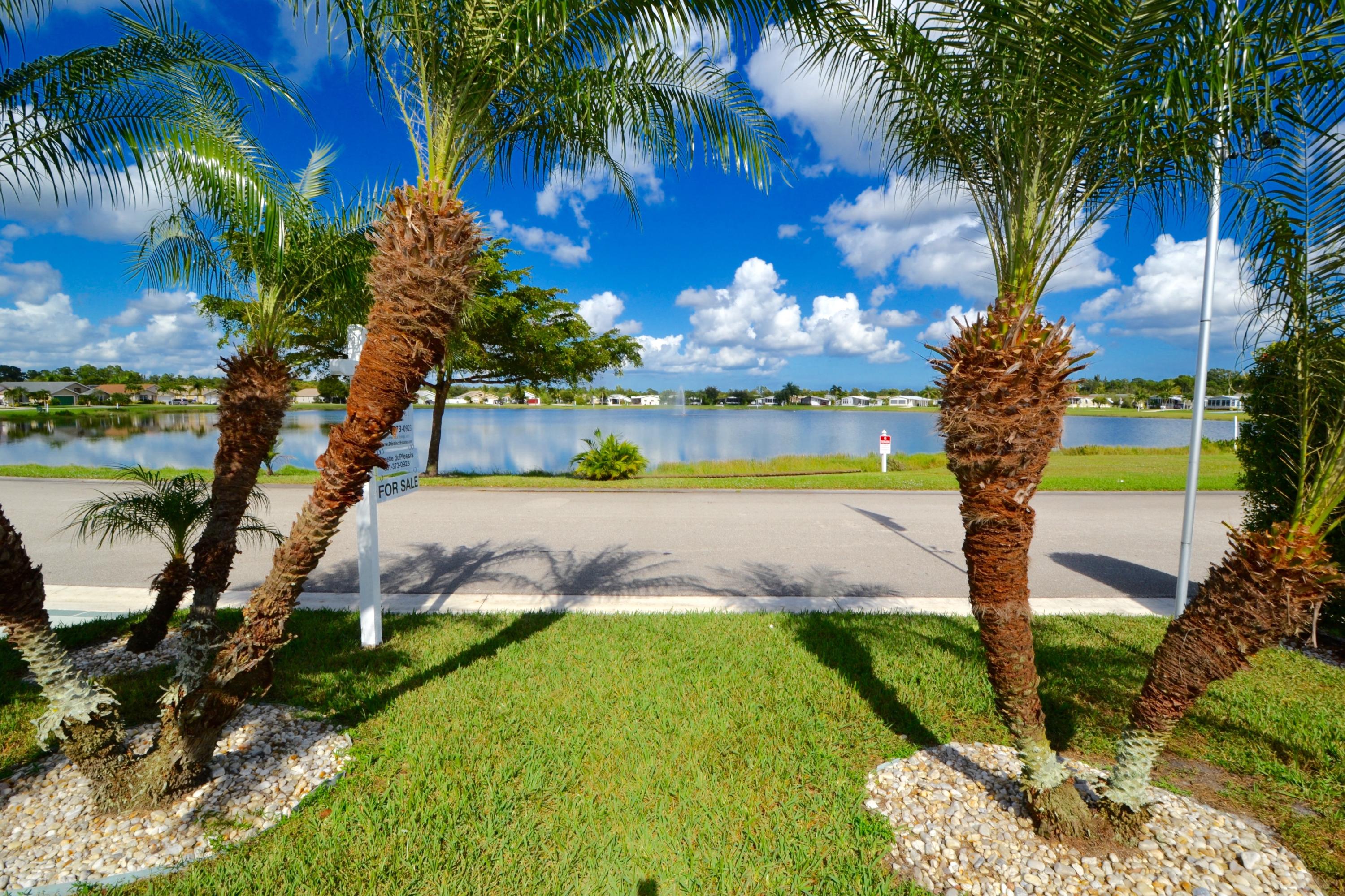 9021 Southwest Chevy Circle Stuart, FL 34997 - Photo 63 of 79 CONVERSATION PIT LOOKS OUT TO LAKE