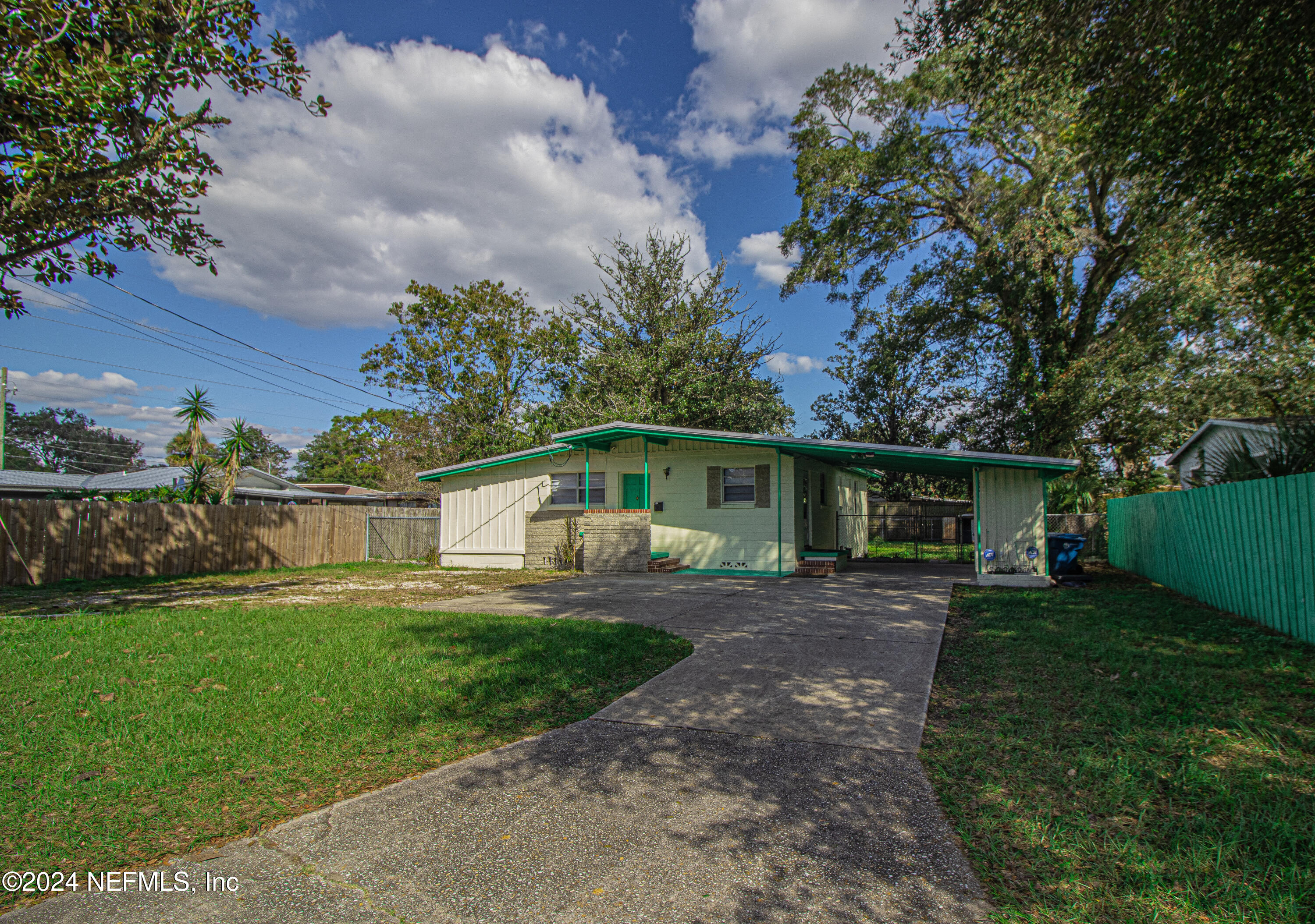 6503 Ector Road Jacksonville, FL 32211 - Photo 3 of 25 a front view of house with yard and green space