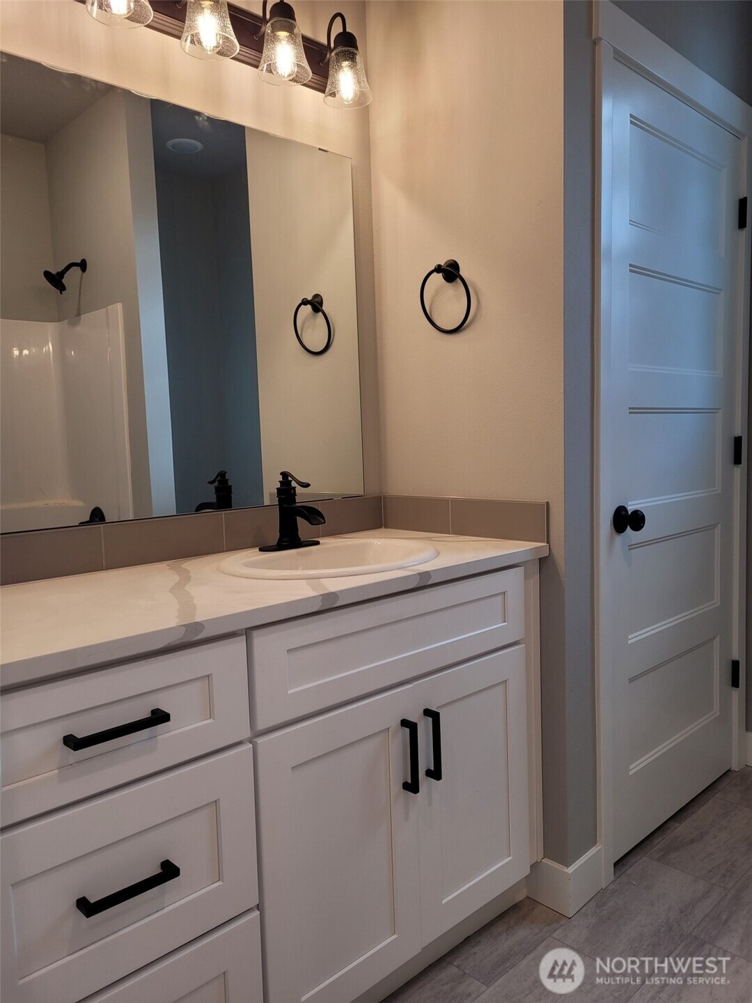 22 Raven Lane Elma, WA 98541 - Photo 14 of 21 a bathroom with a sink and a mirror