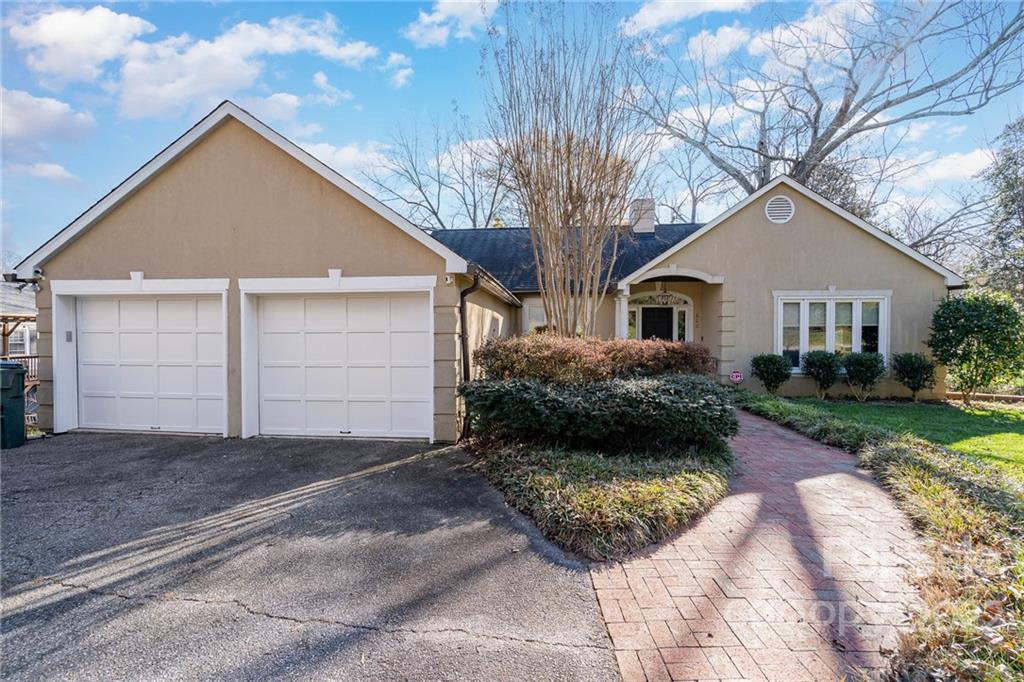 660 6th Street Northwest Hickory, NC 28601 - Photo 1 of 39 a front view of a house with a yard and garage