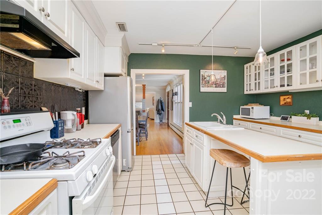 660 6th Street Northwest Hickory, NC 28601 - Photo 11 of 39 a kitchen with a sink and cabinets