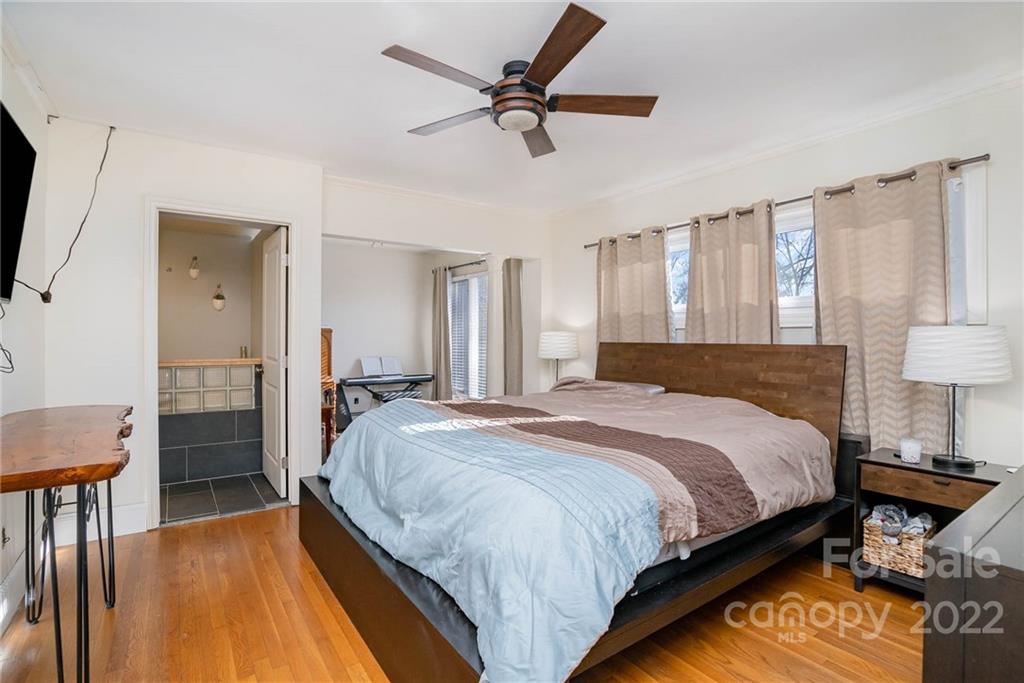 660 6th Street Northwest Hickory, NC 28601 - Photo 14 of 39 a bed sitting in a spacious bedroom next to a window