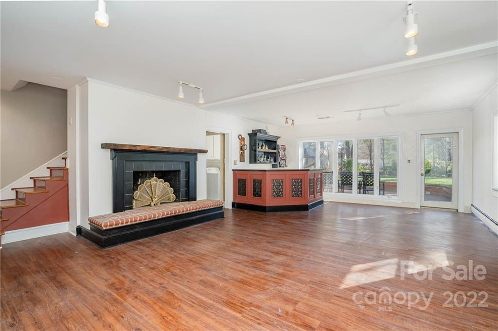 660 6th Street Northwest Hickory, NC 28601 - Photo 25 of 39 a living room with furniture and a fireplace