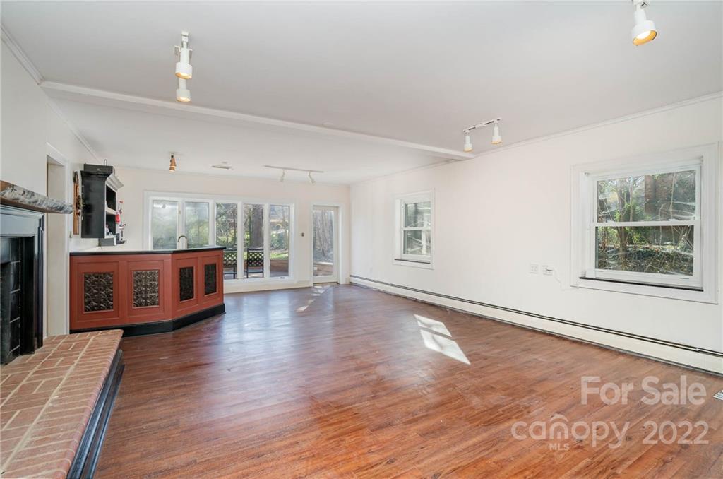 660 6th Street Northwest Hickory, NC 28601 - Photo 26 of 39 a view of an empty room with wooden floor and a window