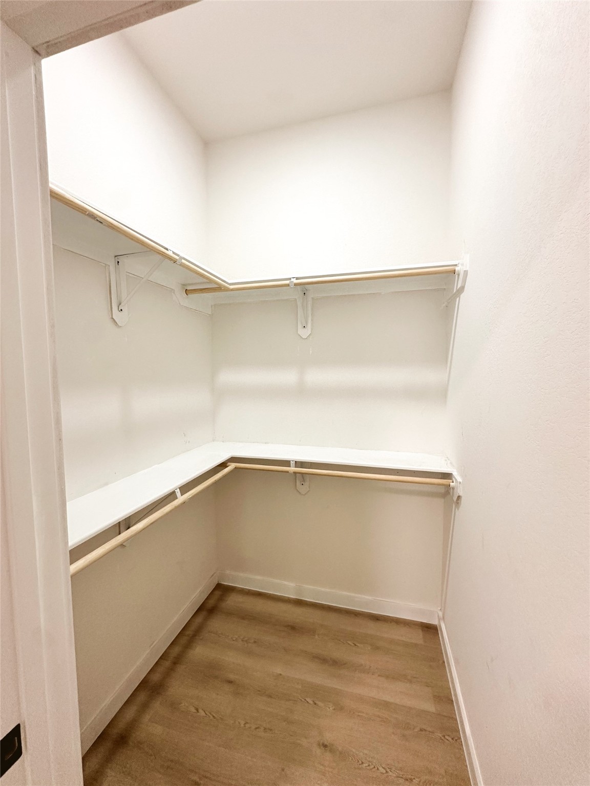 9723 Kerr A-b Street Houston, TX 77029 - Photo 19 of 22 a view of an empty walk in closet