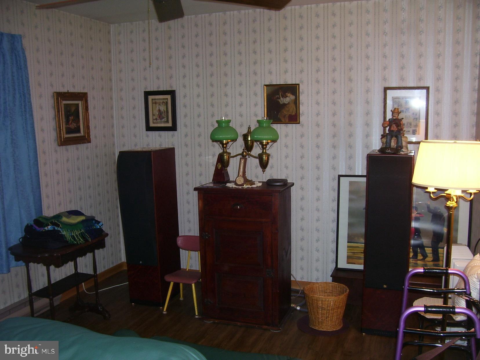 332 Hunters Road Mohnton, PA 19540 - Photo 11 of 16 a view of a workspace with furniture and a potted plant
