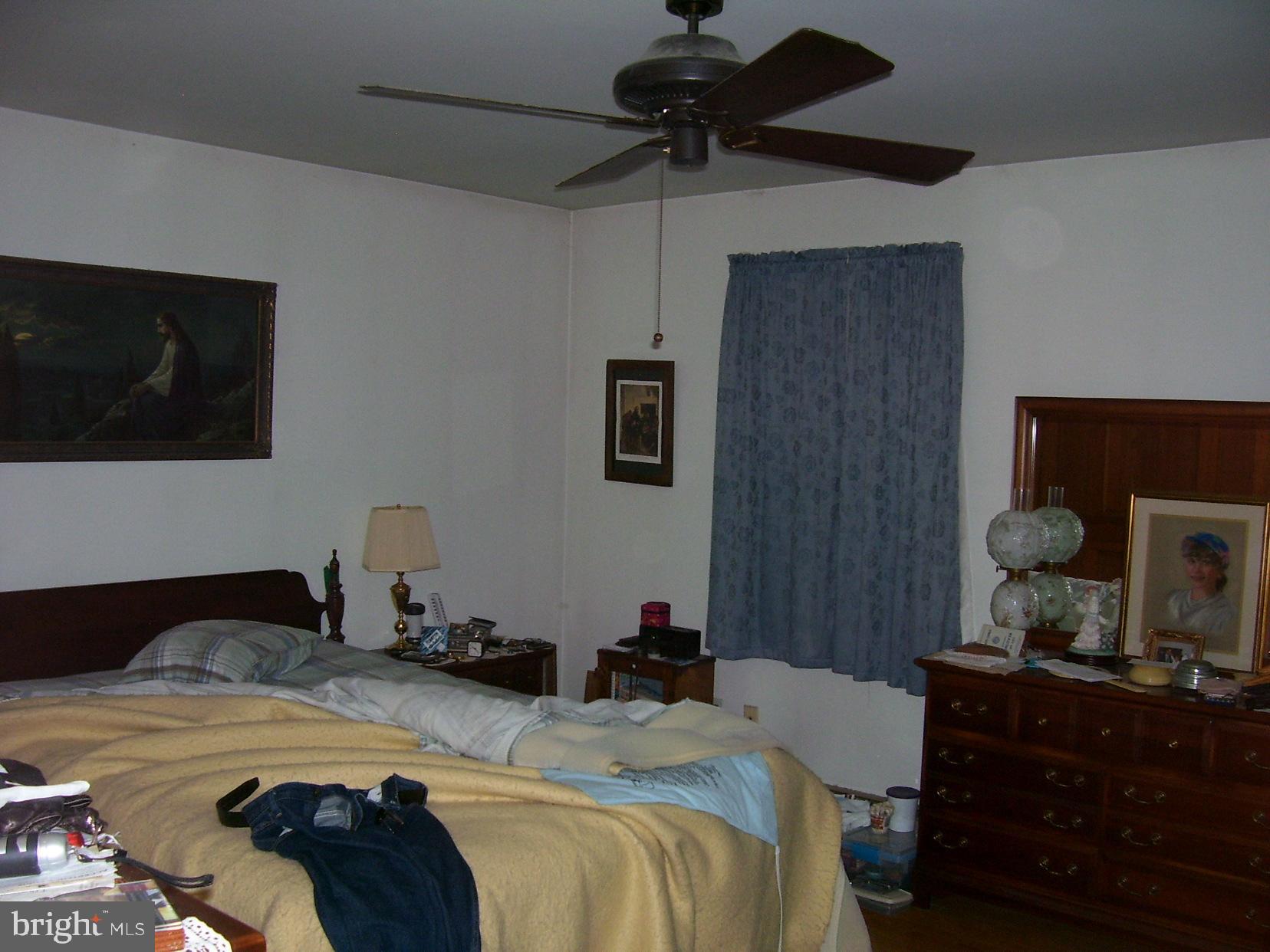 332 Hunters Road Mohnton, PA 19540 - Photo 14 of 16 a bedroom with a bed and a tv