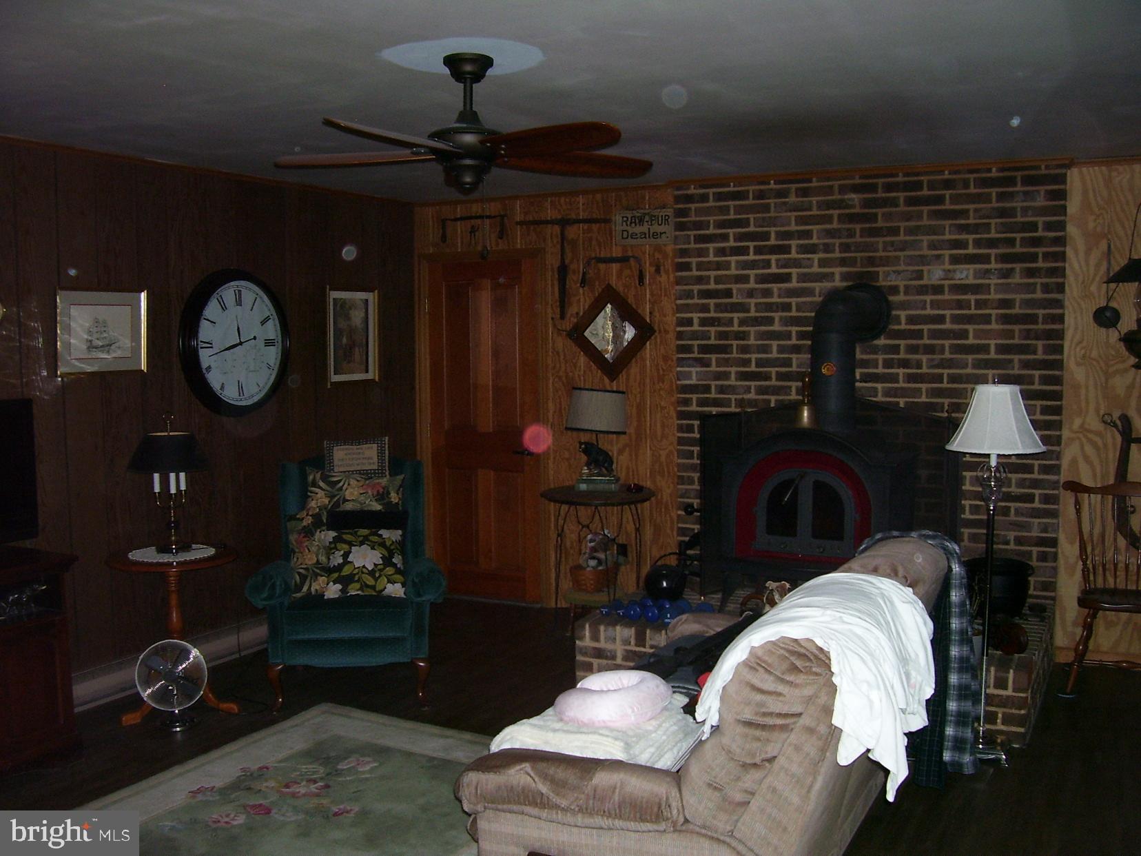 332 Hunters Road Mohnton, PA 19540 - Photo 9 of 16 a living room with furniture a rug and white walls