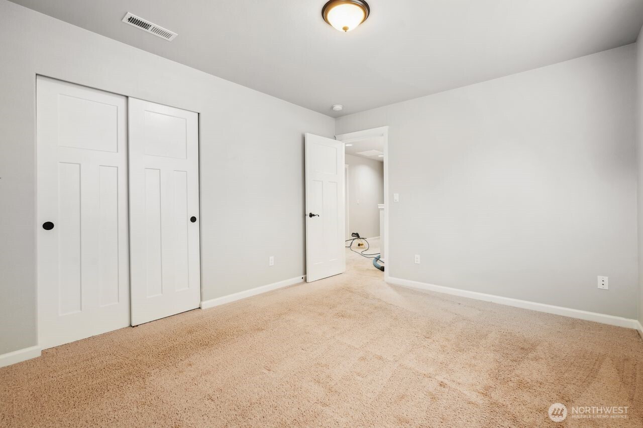 4335 Dudley Drive Northeast Lacey, WA 98516 - Photo 17 of 39 a view of an empty room