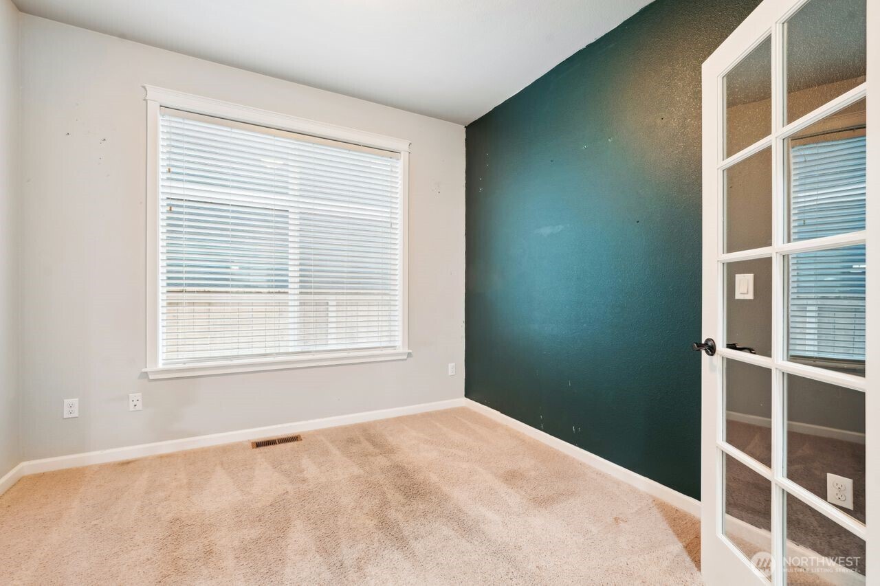 4335 Dudley Drive Northeast Lacey, WA 98516 - Photo 30 of 39 a view of an empty room with a window