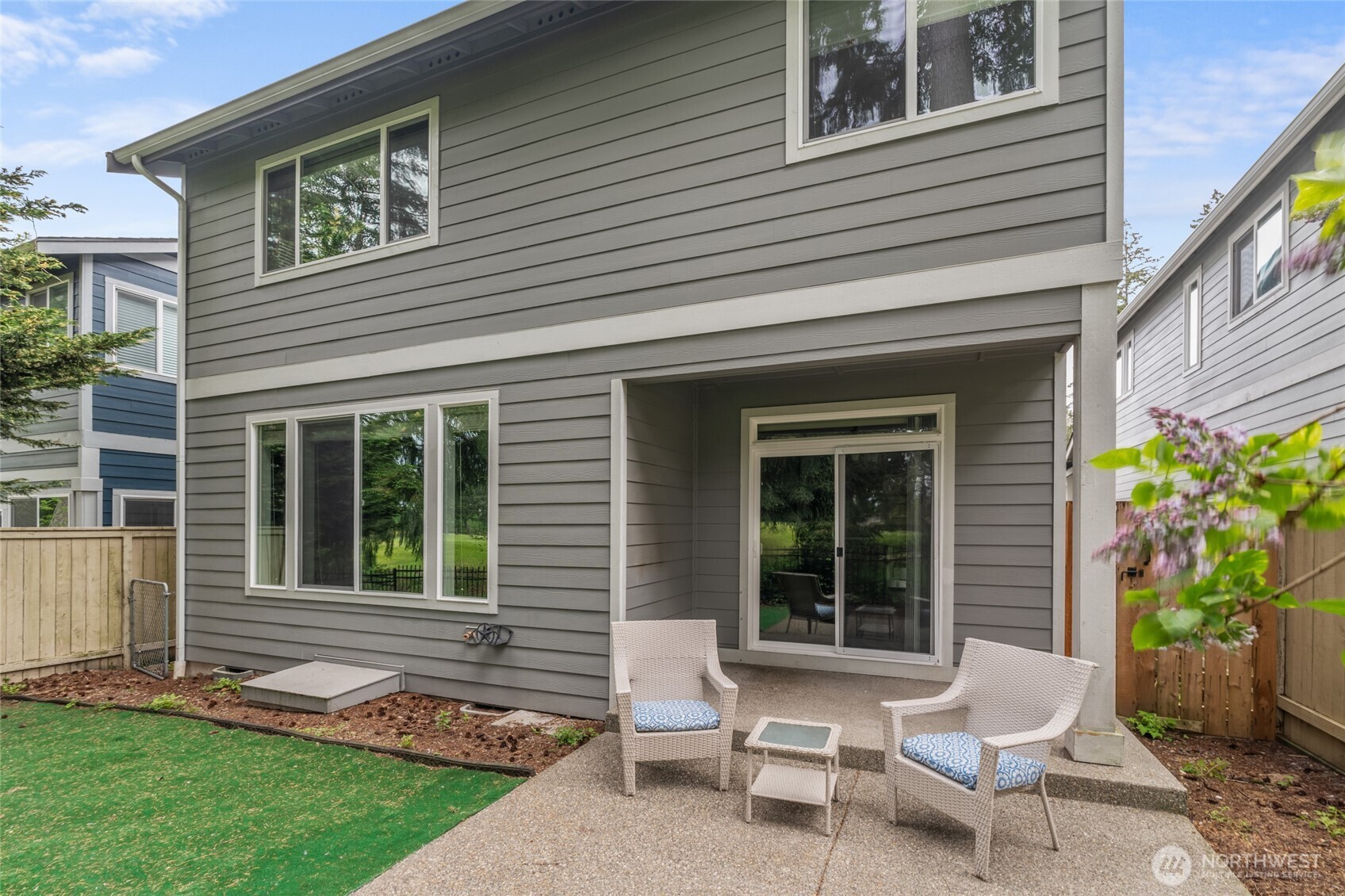 4335 Dudley Drive Northeast Lacey, WA 98516 - Photo 6 of 39 a view of a house with a backyard and a chair