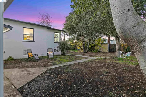 a backyard of a house with lots of green space