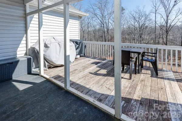 a view of balcony with furniture