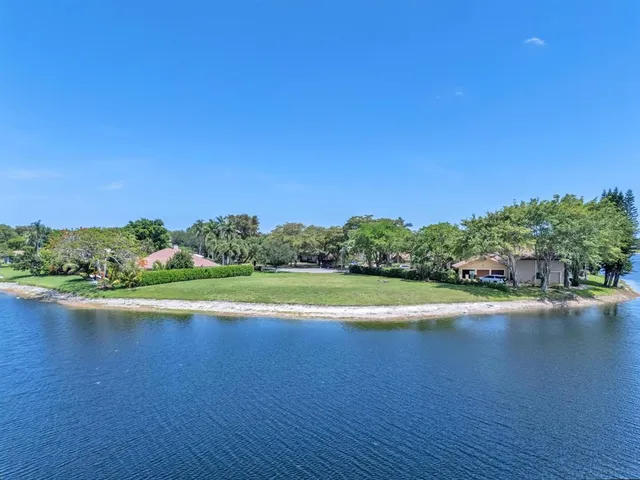 a view of a lake with outdoor space