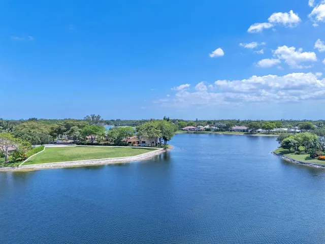 a view of a lake with a city