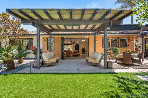 a view of swimming pool with seating space