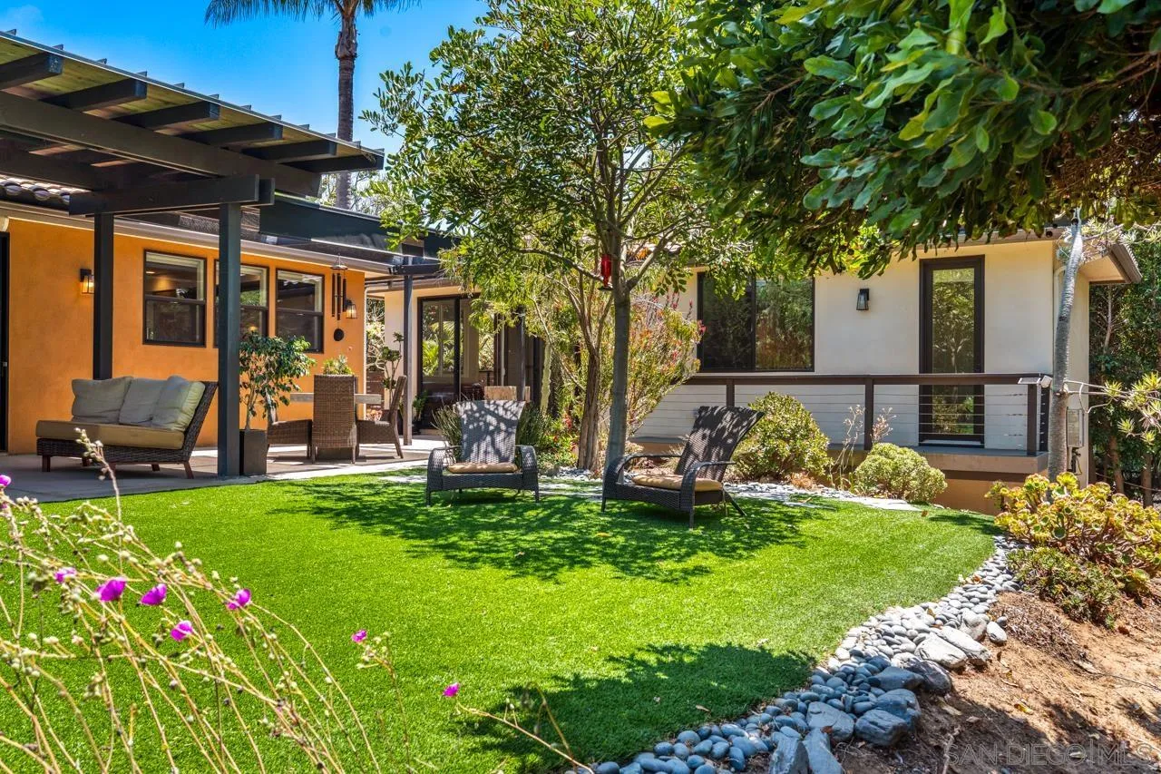 1180 Devonshire Drive Encinitas, CA 92024 - Photo 21 of 53 a view of a house with backyard sitting area and garden