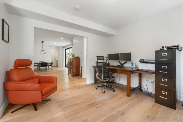 a view of a bathroom with a glass door shower