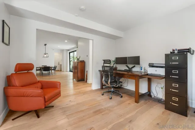 a view of a bathroom with a glass door shower