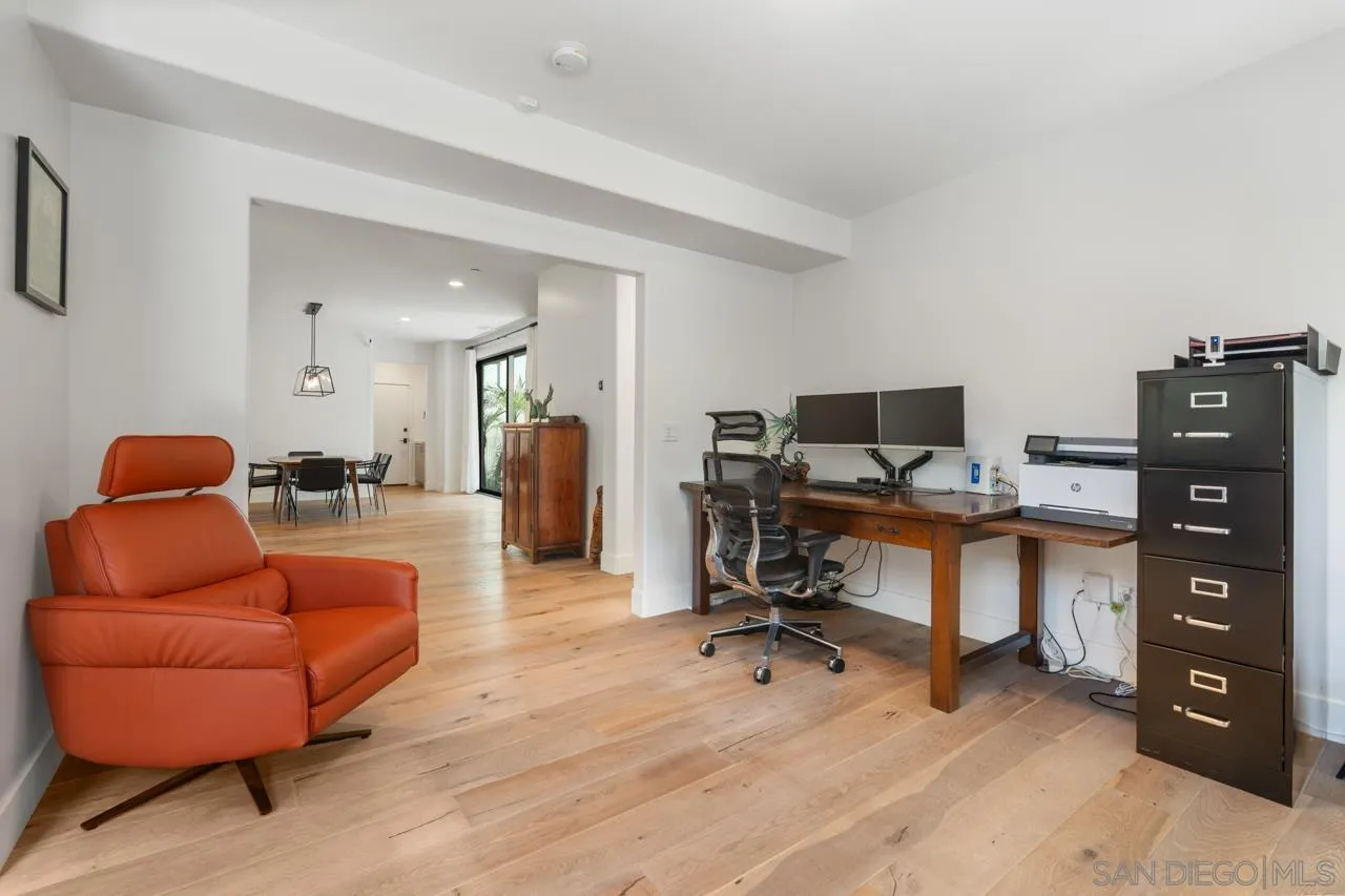 1180 Devonshire Drive Encinitas, CA 92024 - Photo 31 of 53 a view of a livingroom with workspace and a couch