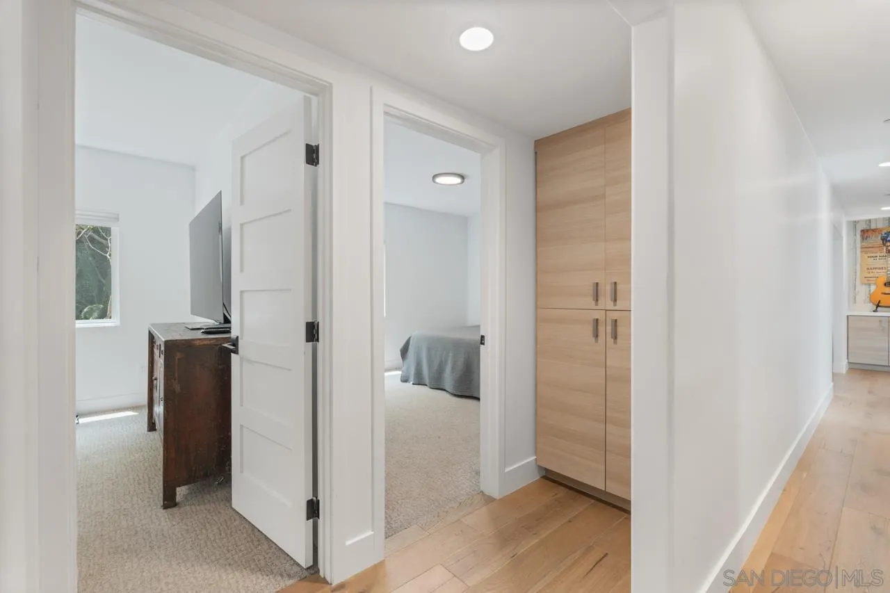 1180 Devonshire Drive Encinitas, CA 92024 - Photo 32 of 53 a view of a bathroom with a glass door shower