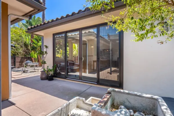 a house view with a garden space