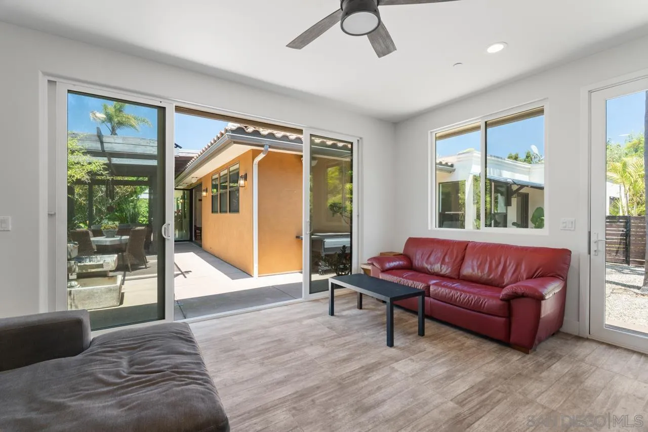 1180 Devonshire Drive Encinitas, CA 92024 - Photo 42 of 53 a living room with furniture and a large window