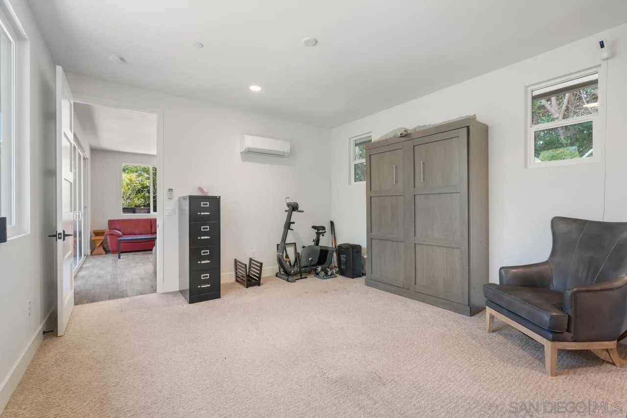 1180 Devonshire Drive Encinitas, CA 92024 - Photo 43 of 53 a view of a livingroom with furniture and a bedroom