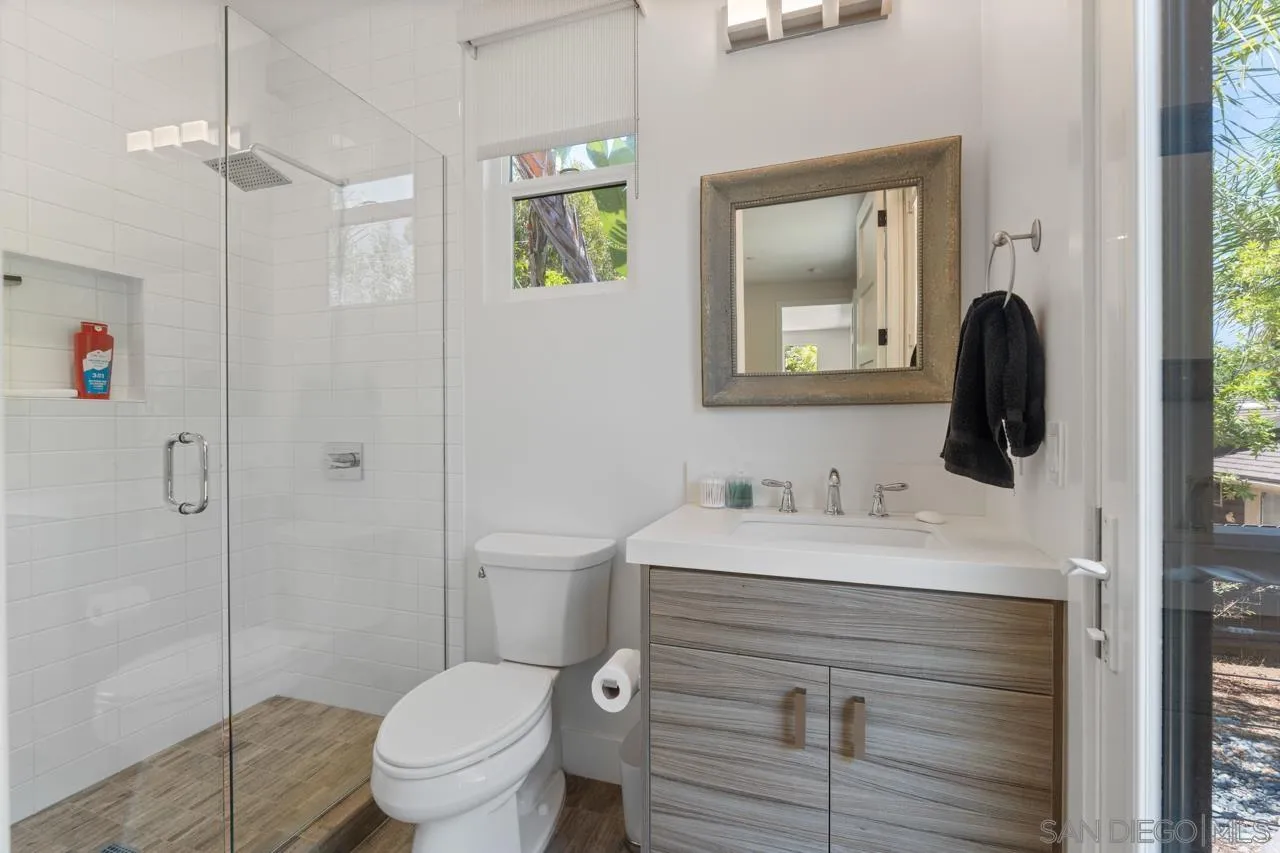1180 Devonshire Drive Encinitas, CA 92024 - Photo 44 of 53 a bathroom with a sink toilet and shower
