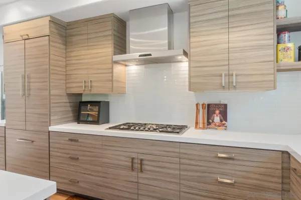 a view of kitchen cabinetry and a fireplace