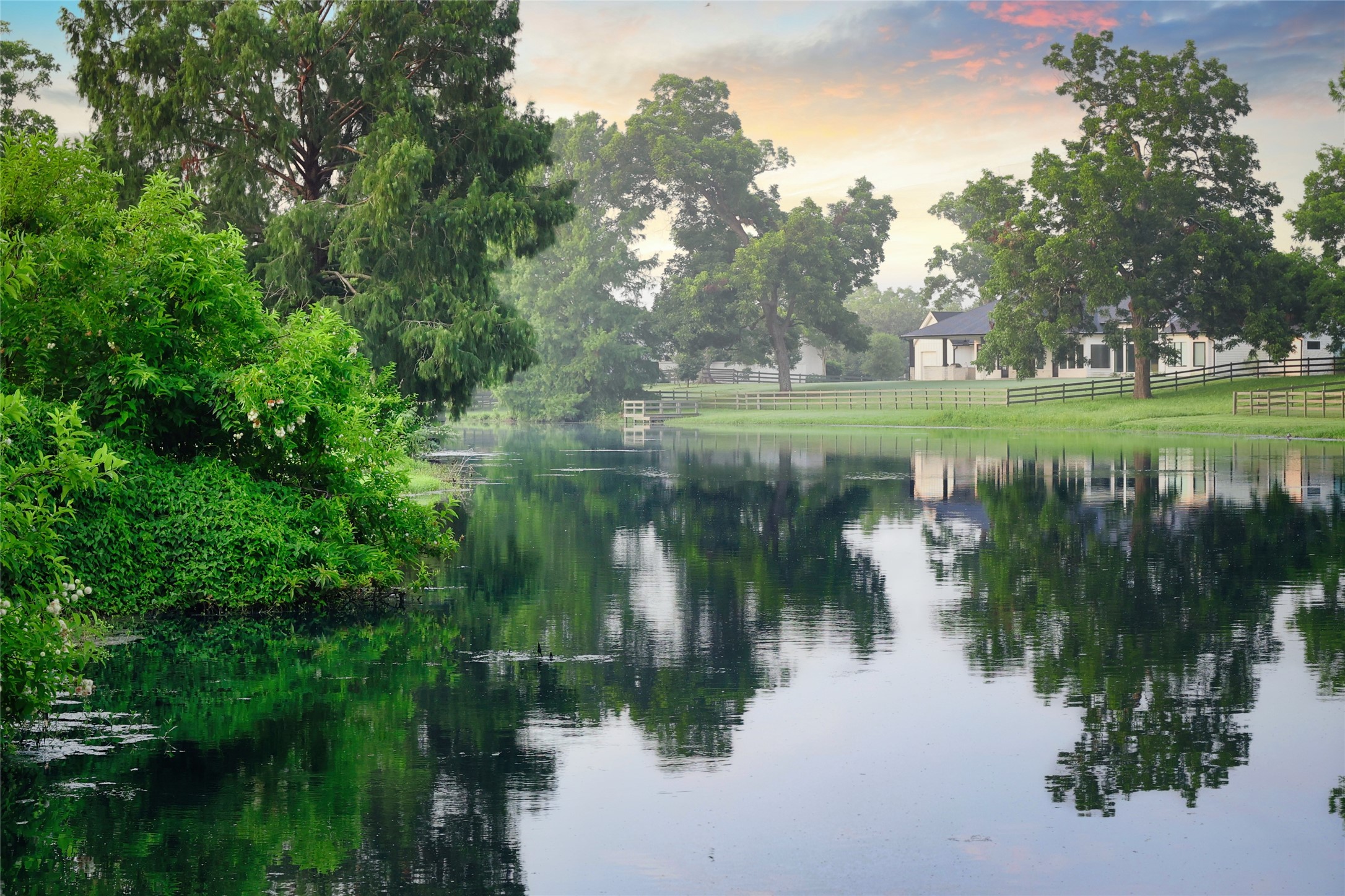 0 Riverlake Road Fulshear, TX 77441 - Photo 13 of 47 Peaceful waterways meander throughout Fulbrook, creating picturesque scenery and tranquil spaces for relaxation, wildlife watching, and enjoying the community's natural surroundings.