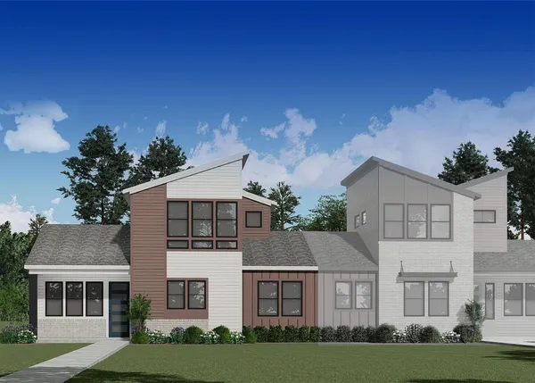 a view of house with yard and green space