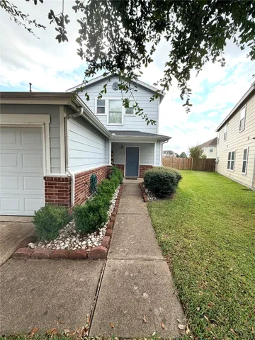 a front view of house with yard