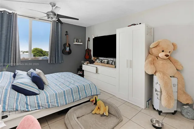 a kitchen with a sink and refrigerator