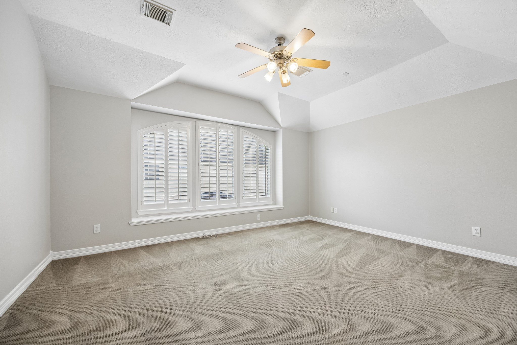 6331 Collina Springs Court Houston, TX 77041 - Photo 22 of 34 a view of an empty room with a window