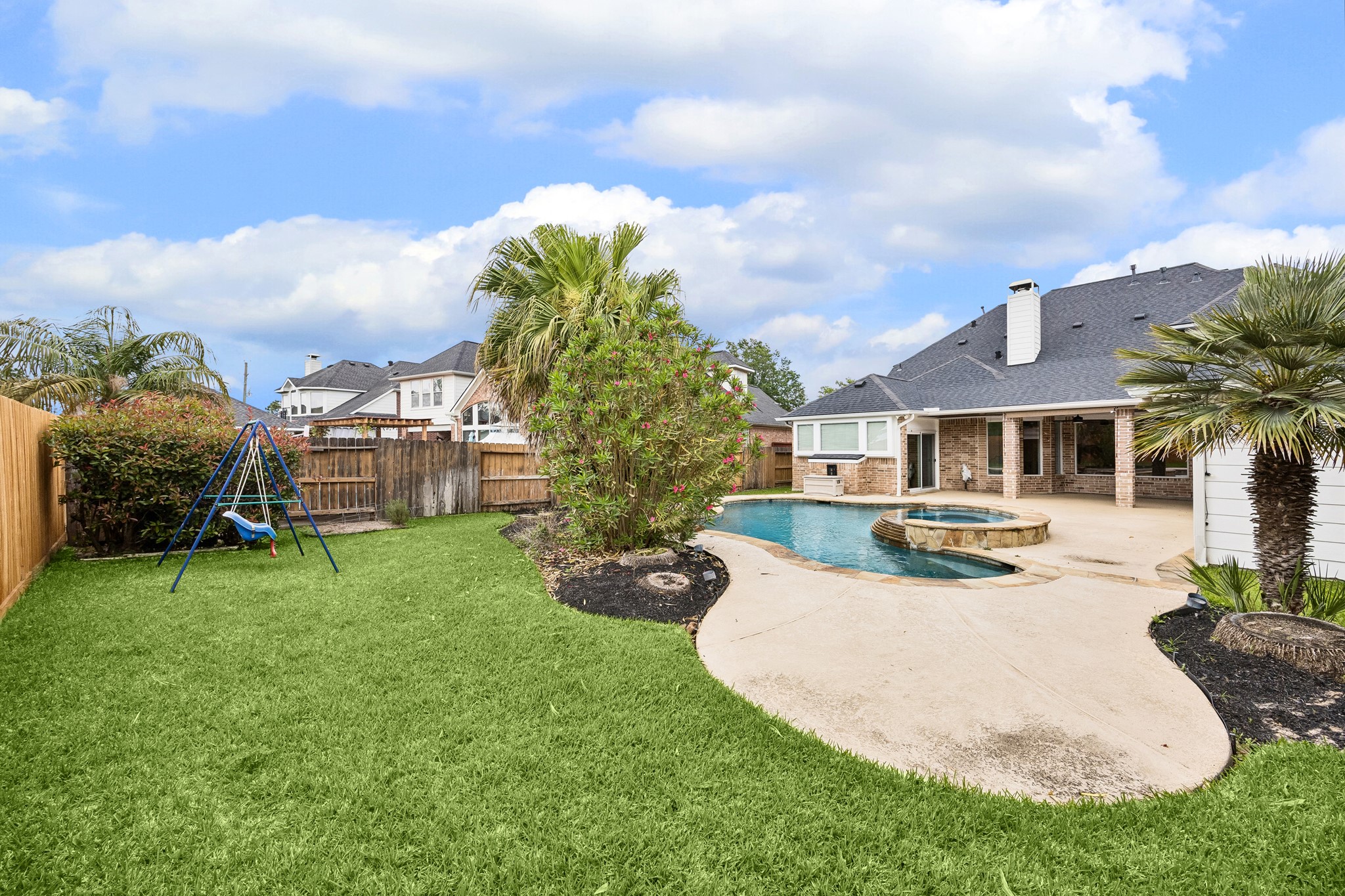 6331 Collina Springs Court Houston, TX 77041 - Photo 34 of 34 a view of a house with a backyard