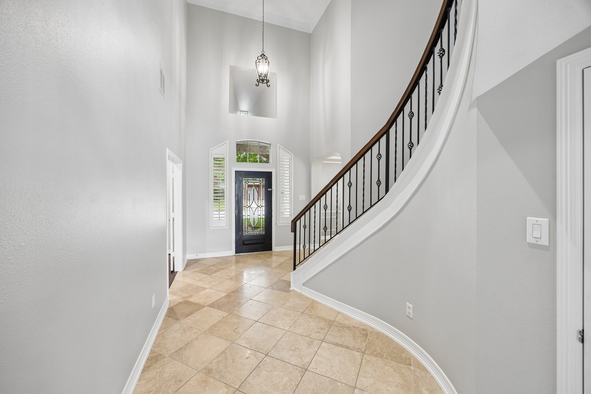 6331 Collina Springs Court Houston, TX 77041 - Photo 4 of 34 a view of entryway and hall with wooden floor