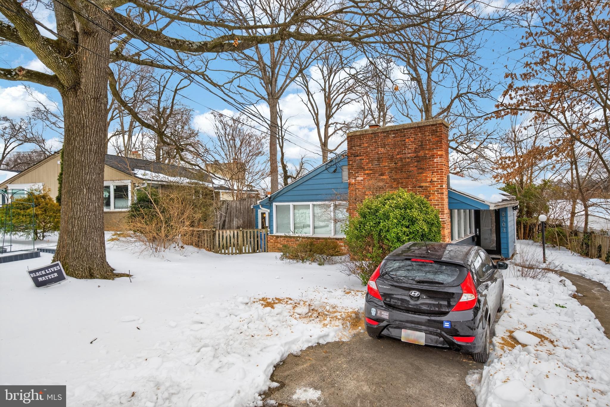8403 Tahona Drive Silver Spring, MD 20903 - Photo 23 of 29 Charming home nestled in a winter landscape.