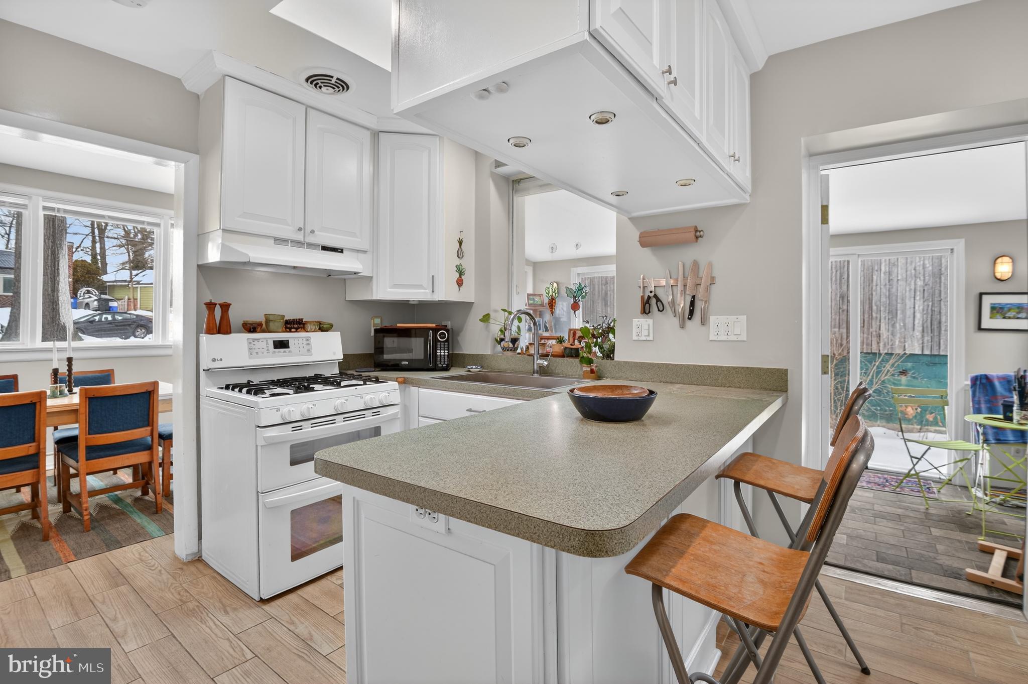 8403 Tahona Drive Silver Spring, MD 20903 - Photo 10 of 29 Bright and inviting kitchen with modern charm.