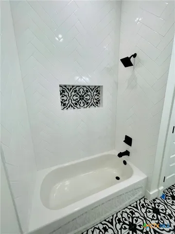 a bathroom with a bathtub