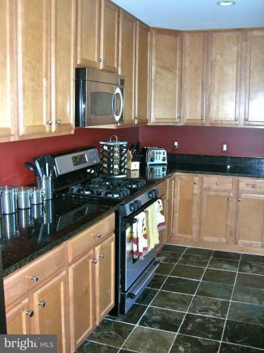 1830 Fountain Drive, Unit 802 Reston, VA 20190 - Photo 5 of 22 Kitchen