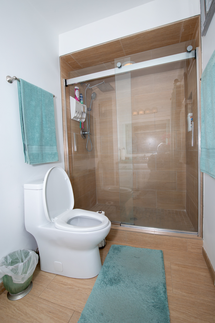 1844 180th Place Lansing, IL 60438 - Photo 11 of 34 a bathroom with a toilet and a shower