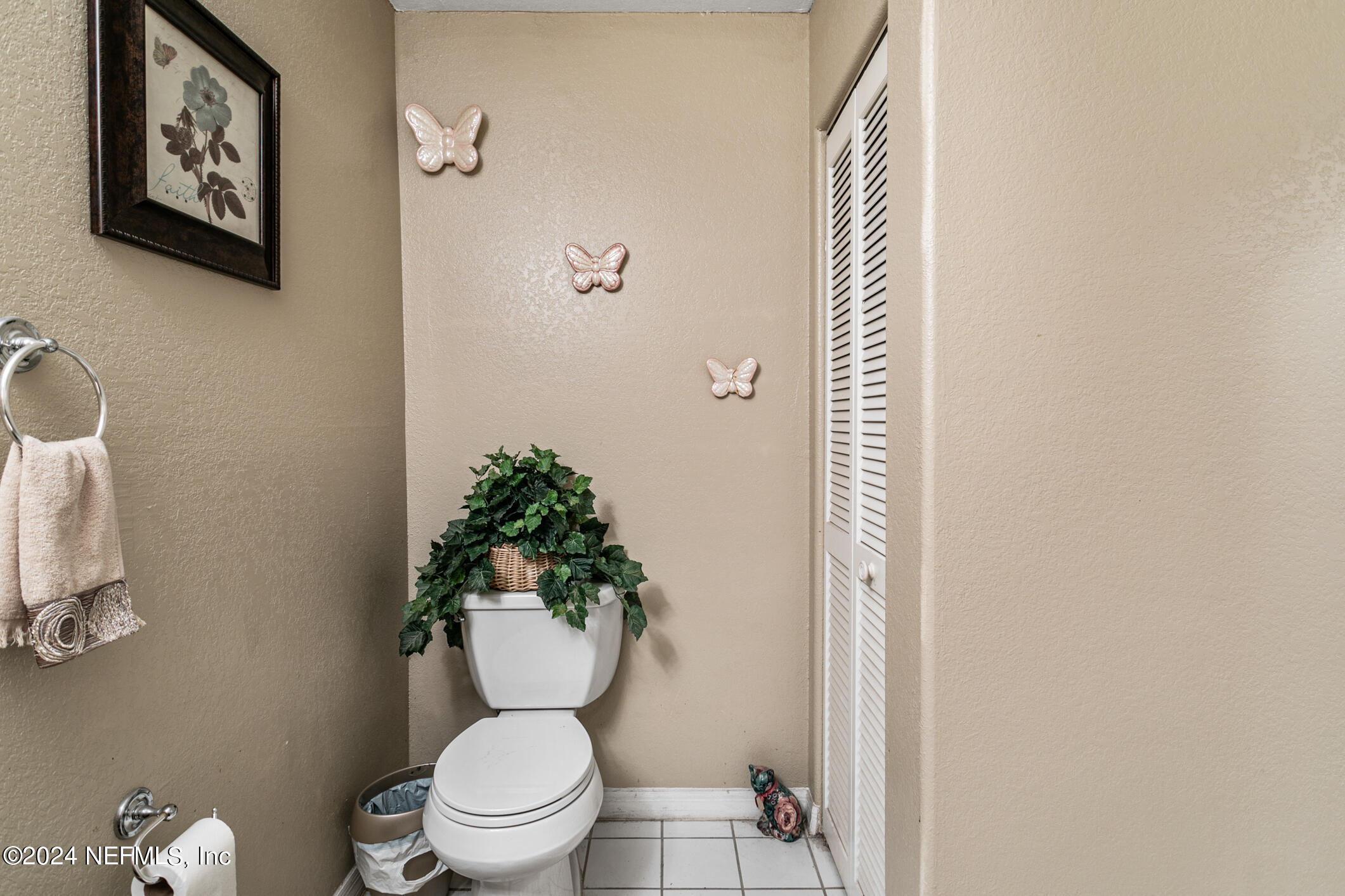 10150 Belle Rive Boulevard, Unit 2605 Jacksonville, FL 32256 - Photo 23 of 52 a bathroom with a toilet and a shower