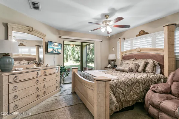 a bathroom with a sink vanity and a mirror
